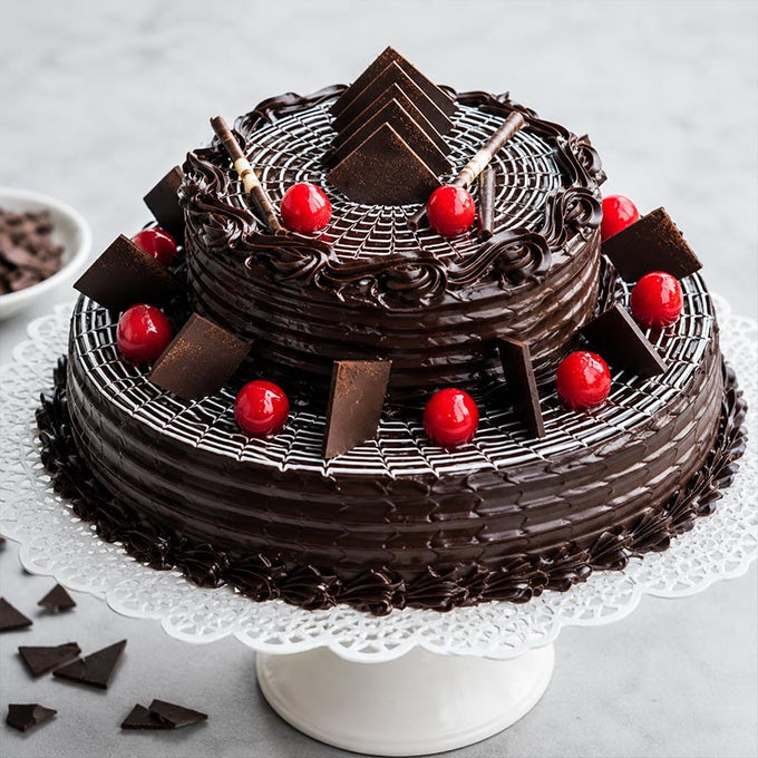 2 Tier Chocolate Truffle Cake with Cherry Decoration - Cake Delivery in Kalyani