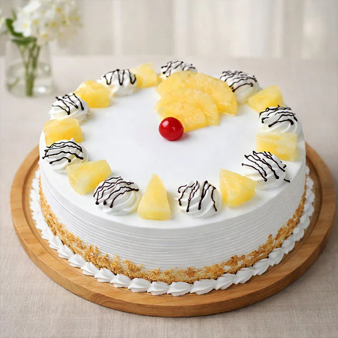 Half Kg Pineapple Fresh Cream Cake with Cherry Topping - Anniversary Gift in Kalyani