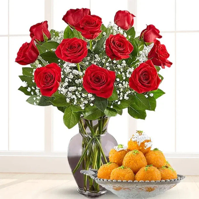 12 Red Roses Arrangement with 500g Moti Choor Laddu - Flower Delivery in Kalyani