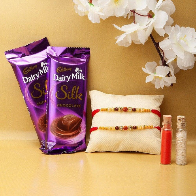 Designer Rakhi Set with 2 Cadbury Dairy Milk Silk Chocolates & Roli Chawal