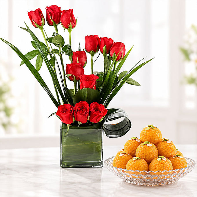12 Red Roses Arrangement with 500g Moti Choor Laddu