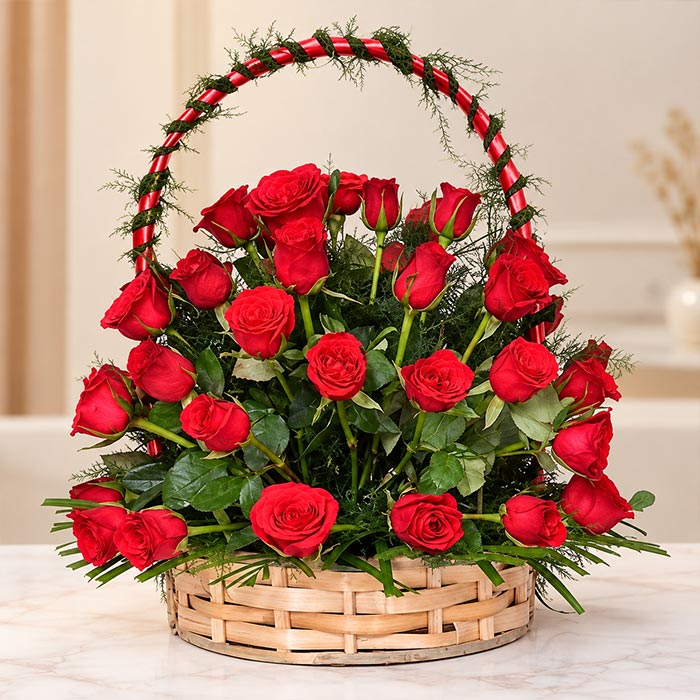 24 Red Roses in Round Wicker Flower Basket