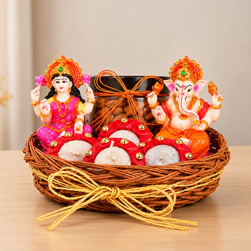 4 Diyas in Basket with Laxmi Ganesha Idol & Almonds