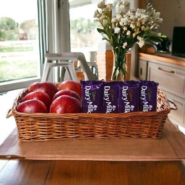 Fresh Apple Basket with 4 Cadbury Dairy Milk Chocolate Bars - Flower Delivery in Kalyani