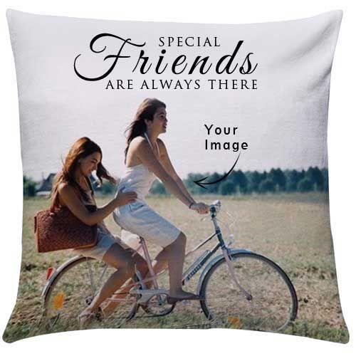Decorative pillow with two women on a bike and text 'Special friends are always there' on a white background.