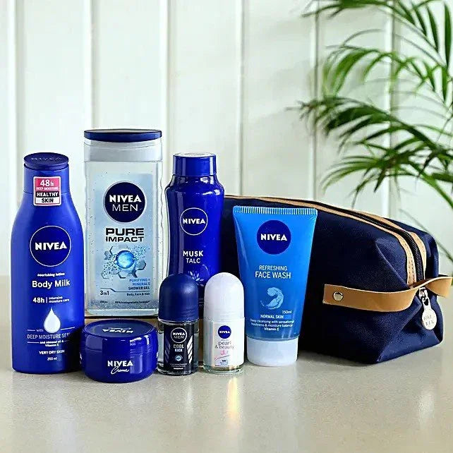 Collection of Nivea men's skincare products on a white surface with a plant in the background.