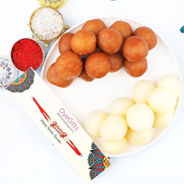 Assorted sweets including ladoos and white balls on a plate with 'OyeGifts' packaging.