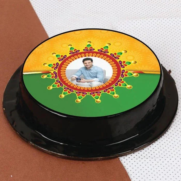 Round cake with decorative top and photo of a man and child, on a white and brown background