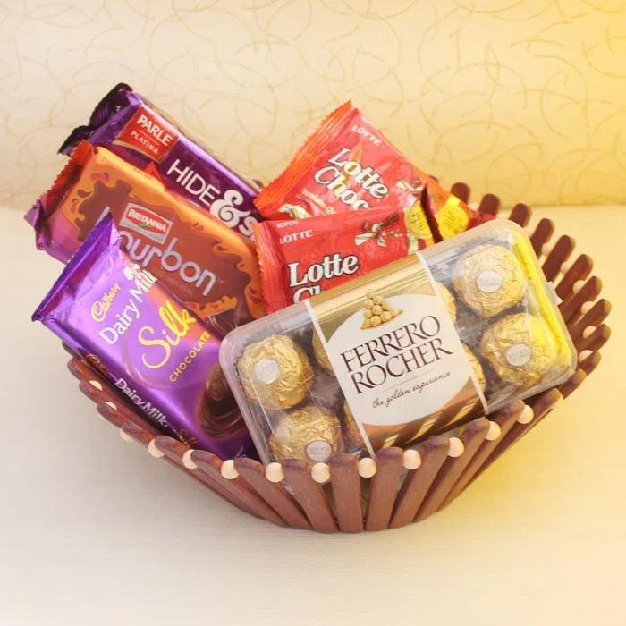 Basket of assorted chocolates including Ferrero Rocher, Cadbury, and Lotte.
