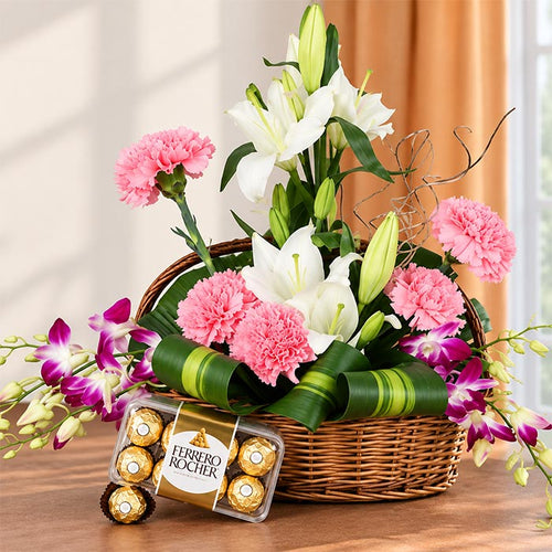Basket Arrangement of White Asiatic Lilies, Pink Carnations with Ferrero Rocher 16 Pcs