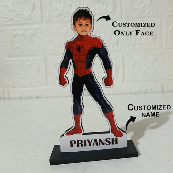 Cardboard cutout of a superhero figure with 'Priyansh' on a white background