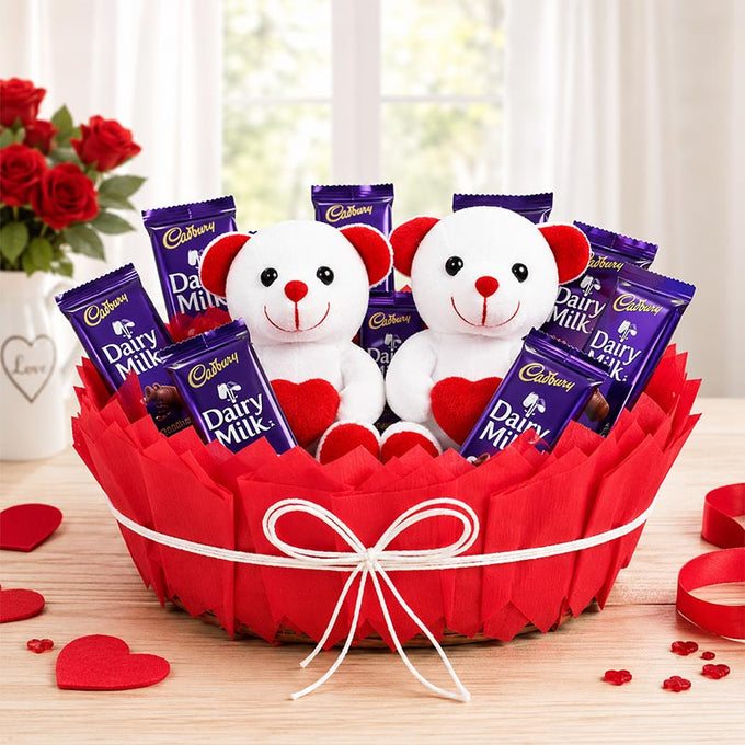 Cadbury Dairy Milk Chocolates with 2 Teddy Bears in Cane Basket