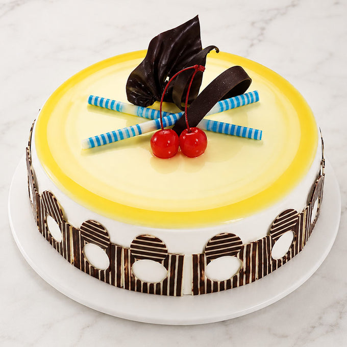 Pineapple Cream Cake 1 Kg with Chocolate Decoration - Cake Delivery in Kalyani