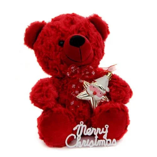 Red teddy bear with a Christmas ornament and 'Merry Christmas' sign, festive gift idea