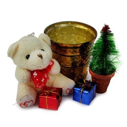 Gift set with plush teddy bear, small potted tree, gold cups, and wrapped presents