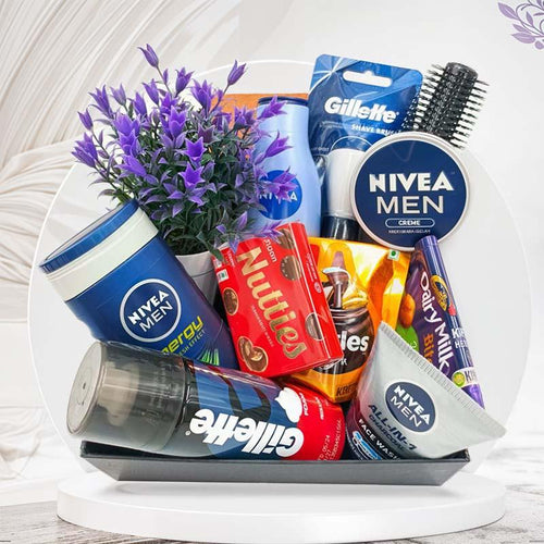 Grooming and snack set with Nivea, Gillette, and chocolate bars in a decorative display.