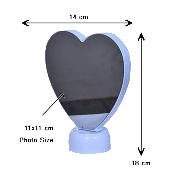 Heart-shaped mirror with dimensions labeled on a white background