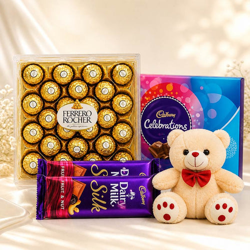 Ferrero Rocher chocolates, Cadbury Celebrations, Dairy Milk Silk bars, and a teddy bear on a decorative background.