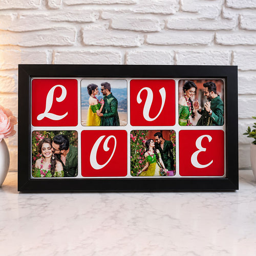Framed photo collage with 'LOVE' letters on a white brick wall background