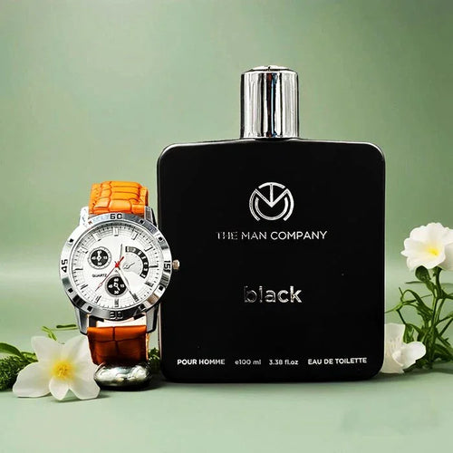 Black perfume bottle and watch with orange strap on a green background
