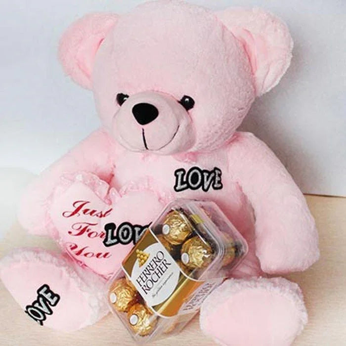 Pink teddy bear holding a box of Ferrero Rocher chocolates with 'LOVE' text.