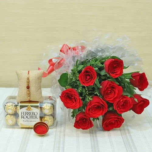 Bouquet of red roses with a box of Ferrero Rocher chocolates on a light background