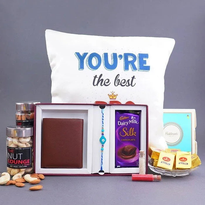 Evil Eye Rakhi With Cushion Gift Hamper