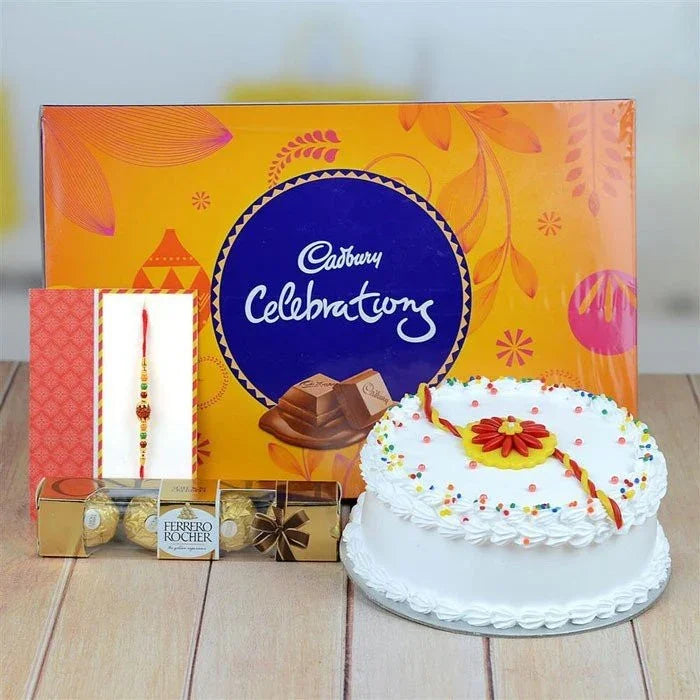 Cadbury Celebrations chocolate box, Ferrero Rocher, and a decorated cake on a wooden surface.