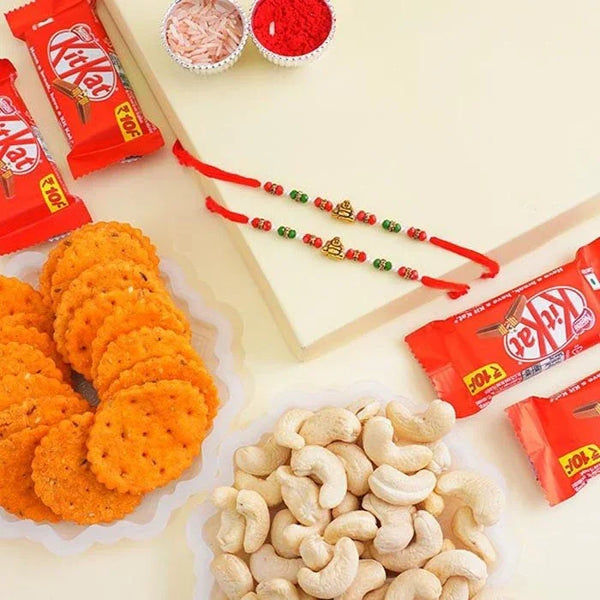 Double Buddha Rakhi With Chocolates Gift Pack