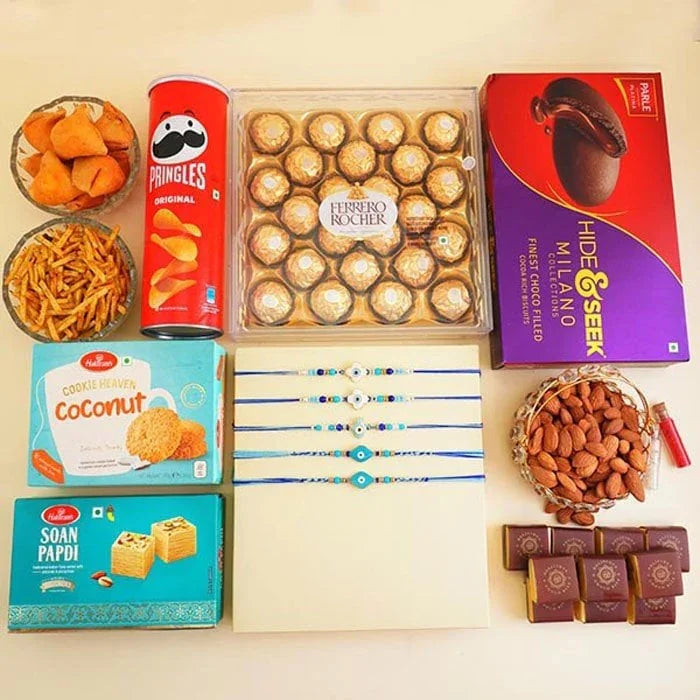 Five Evil Eye Rakhis With Sweets N Snacks Gift Hamper