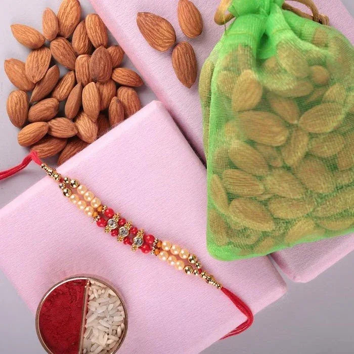 Single Pearl Rakhi With Almond 100 Gm
