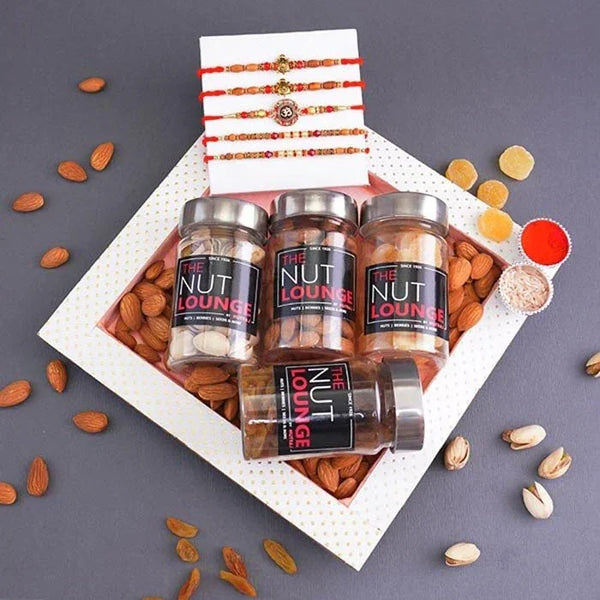 Jars of 'The Nut Lounge' on a decorative card with nuts and ribbons on a gray background