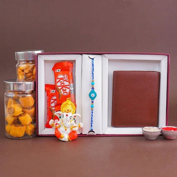 Gift set with jars, snacks, a wallet, and decorative items on a brown background