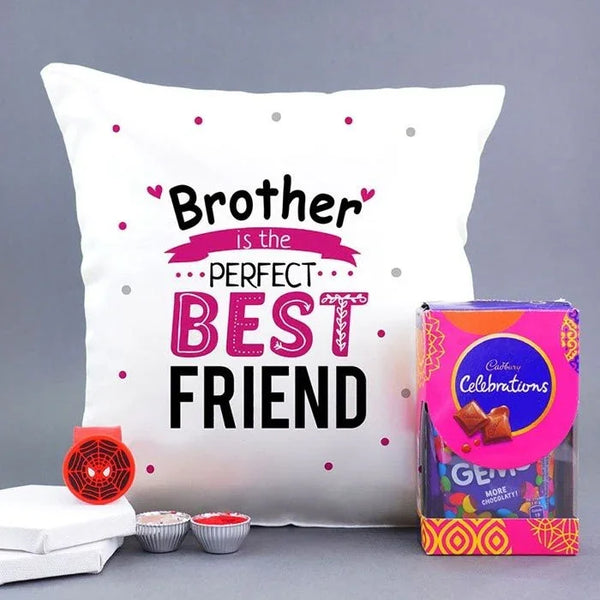 Decorative pillow with text and a box of Cadbury Celebrations chocolate on a gray background