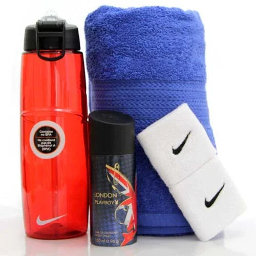 Sports gift set with red water bottle, blue towel, white wristbands, and body spray