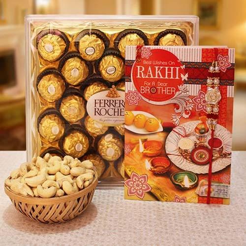 Ferrero Rocher chocolates in a box with a Rakhi card and cashew nuts on a table.
