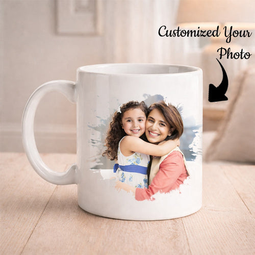 White mug with a printed photo of two children hugging on a wooden surface.