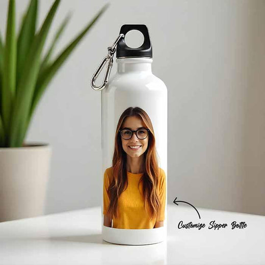 White water bottle with a photo of a woman printed on it, placed on a white surface 