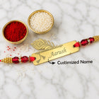 Personalized Peacock Feather Gold Name Rakhi with Red Crystal Beads customer review image