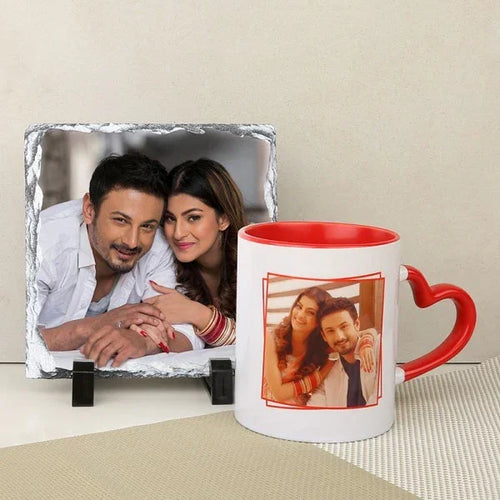 Mug with a printed photo of a couple and a small photo frame on a beige surface.