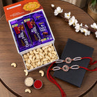 Set Of 2 Silver Om Rakhi With Cashews And Chocolates customer review image