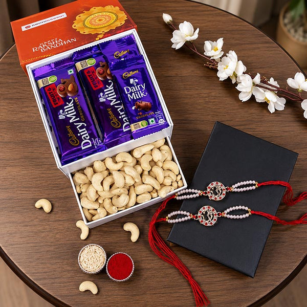 Set Of 2 Silver Om Rakhi With Cashews And Chocolates