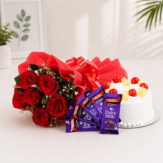 Red Roses Bouquet with Half Kg Pineapple Cake & 5 Dairy Milk Chocolates - Flower Delivery in GiftsGhaziabad