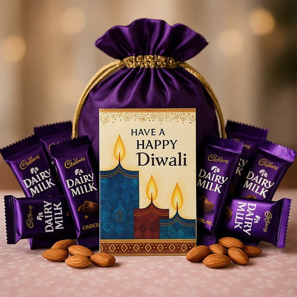 Diwali gift hamper with purple pouch, Dairy Milk chocolates, almonds, and Happy Diwali card