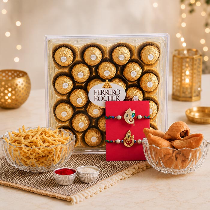 Two Auspicious Golden Rakhi With Sweets And Snacks
