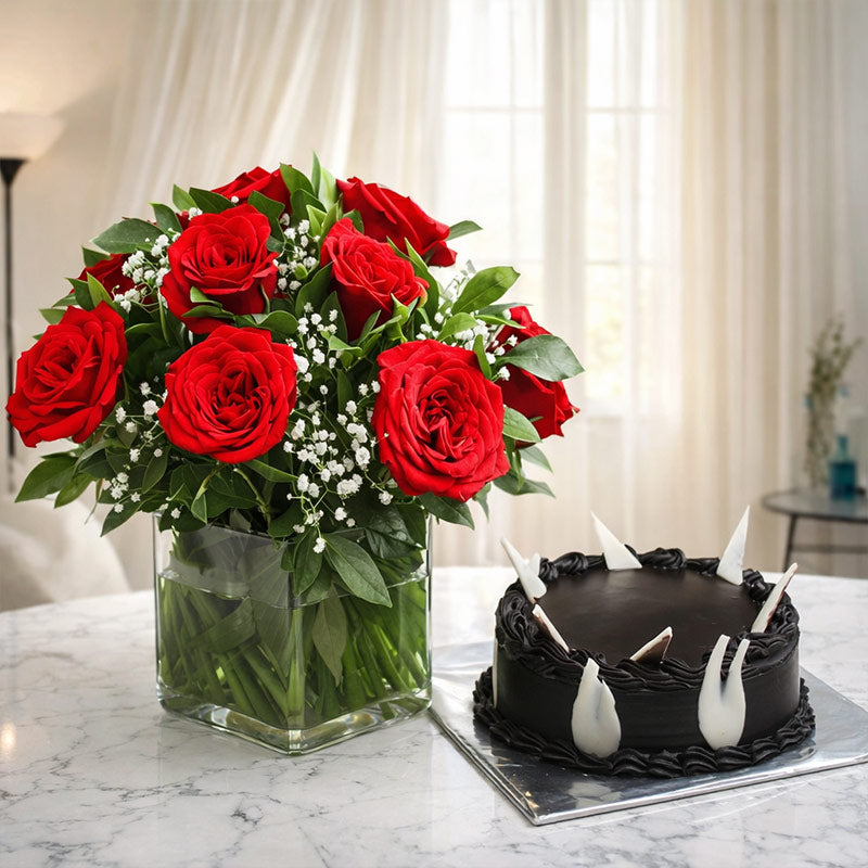 Vase Of Red Roses And Chocolate Cake
