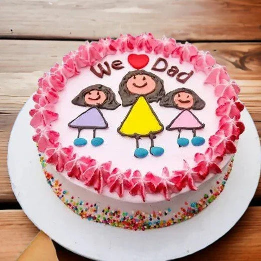 Cake with pink frosting, cartoon figures, and 'We love Dad' text on a wooden surface