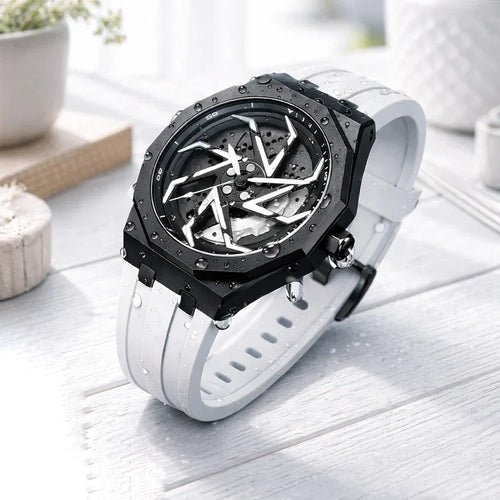 Black and white watch on a light wooden surface