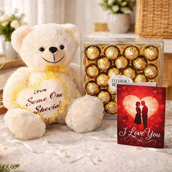 Teddy bear with heart pillow, Ferrero Rocher chocolates, and I Love You card, romantic gift combo