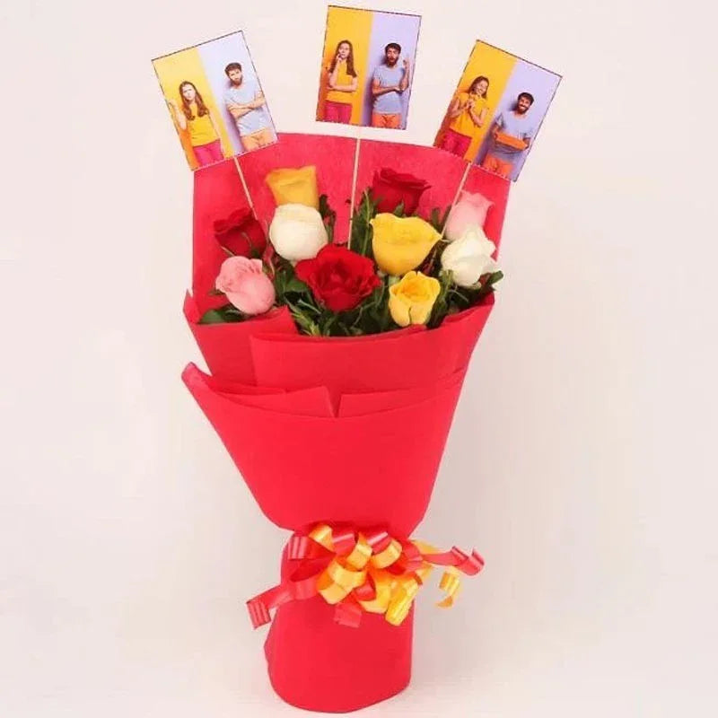 Bouquet of flowers with a red wrap and yellow ribbon on a white background